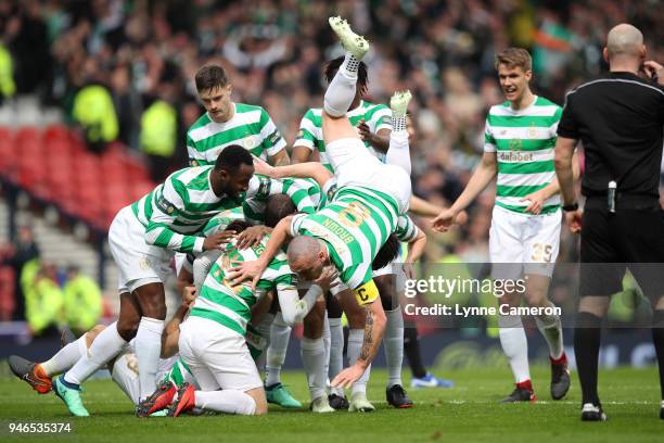 Tom Rogic and Scott Brown of Celtic celebrate during the Scottish Cup Semi Final between Rangers and Celtic at Hampden Park on April 15, 2018 in...