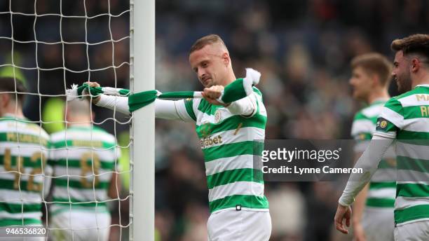 Leigh Griffiths of Celtic ties a scarf to the post after the Scottish Cup Semi Final between Rangers and Celtic at Hampden Park on April 15, 2018 in...