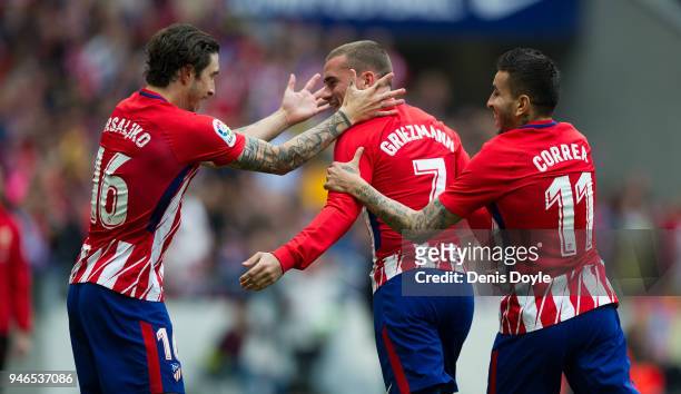 Antoine Greizmann of Atletico de Madrid celebrates with Sime Vrsaljko and Angel Correa after scoring his teamÕs second goal during the La Liga match...