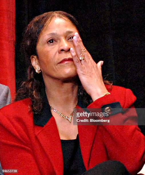 Rutgers Unversity's women's basketball team coach C. Vivian Stringer wipes away her tears during a news conference regarding comments made by CBS...