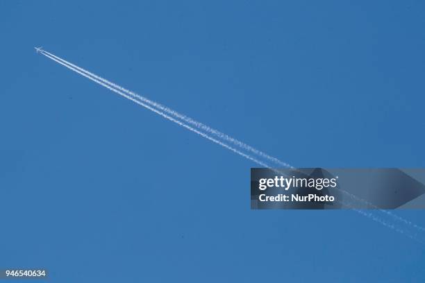 Various images of airplanes overflying Thessaloniki, Greece between 30.000-40.000 feet against the blue sky in April 2018. There are planes with the...