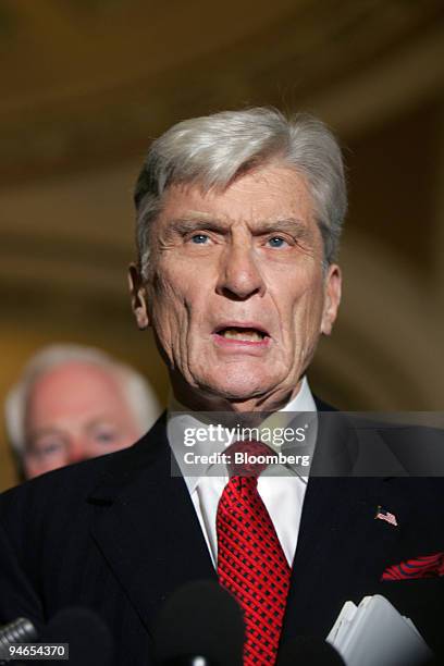 Senator John Warner of Virginia speaks at a news conference in the U.S. Capitol building after a meeting with White House officials to discuss U.S....