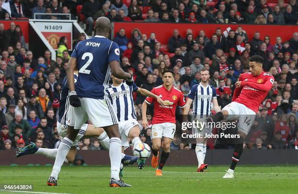 Jesse Lingard of Manchester United has a shot on goal during the Premier League match between Manchester United and West Bromwich Albion at Old...