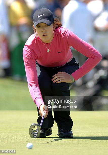 Michelle Wie lines up her shot on the green during the final round of the SK Telecom Open at Sky 72 Golf Club in Incheon, west of Seoul, South Korea,...