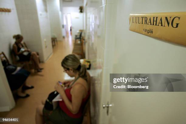 Expectant mothers wait outside an ultrasound clinic in the maternity ward of the Szent Margit hospital in Budapest, Hungary, on Friday, Aug. 10,...