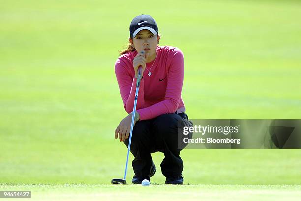 Michelle Wie lines up her shot on the green during the final round of the SK Telecom Open at Sky 72 Golf Club in Incheon, west of Seoul, South Korea,...