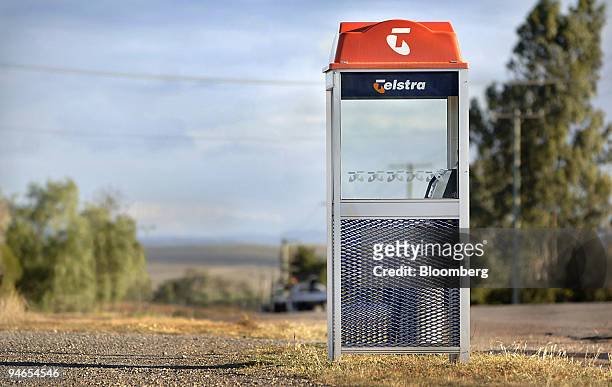 Telstra Corp. Pay telephone booth is seen in the rural area of Scone, in northern New South Wales, Australia, on Tuesday, April 10, 2007. Telstra...