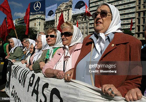 Hebe de Bonafini , president of human right organization Mothers of Plaza de Mayo walk thourgh dowtown Buenos Aires , Monday, April 9, to protest for...