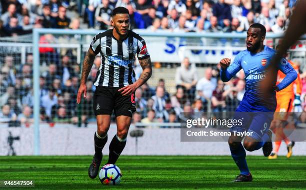 Jamaal Lascelles of Newcastle United looks to pass the ball during the Premier League match between Newcastle United and Arsenal at St.James' Park on...