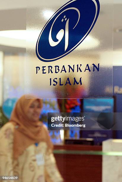 Customer relations officer is seen working at the Al Rajhi Bank in Kuala Lumpur, Malaysia, on Monday, Feb. 5, 2007.