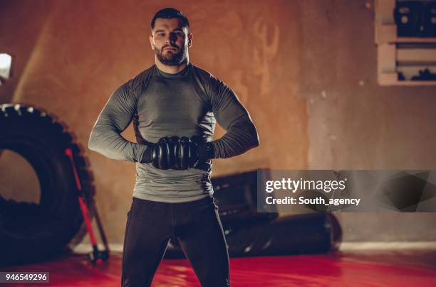 mma fighter - angry bodybuilders posing stock pictures, royalty-free photos & images