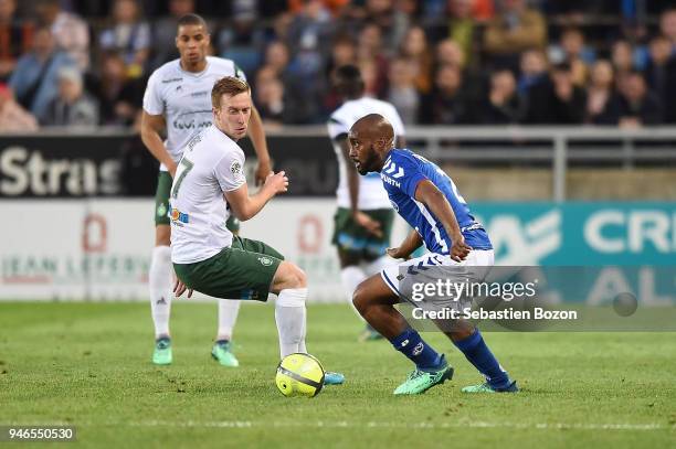 Robert Beric of Saint Etienne and Dimitri Foulquier of Strasbourg during the Ligue 1 match between Strasbourg and Saint Etienne on April 14, 2018 in...