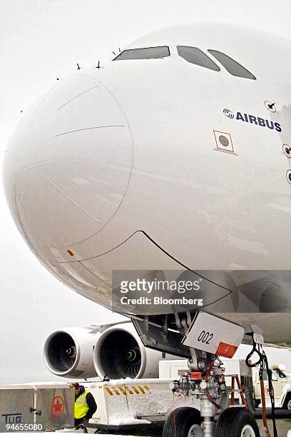 The Airbus A380 plane is serviced at Vancouver International Airport , British Columbia, Canada, after making its first North American landing on a...