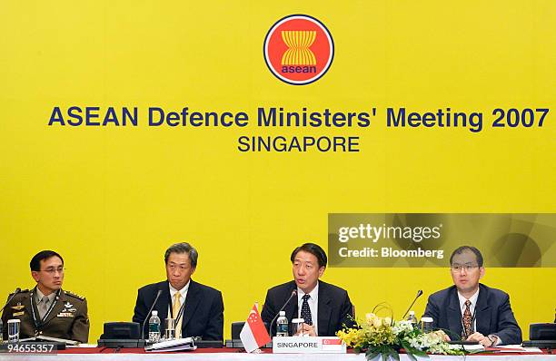 Teo Chee Hean, Singapore's minister for defense, second right, delivers the opening address at a meeting of Association of Southeast Asian Nations...