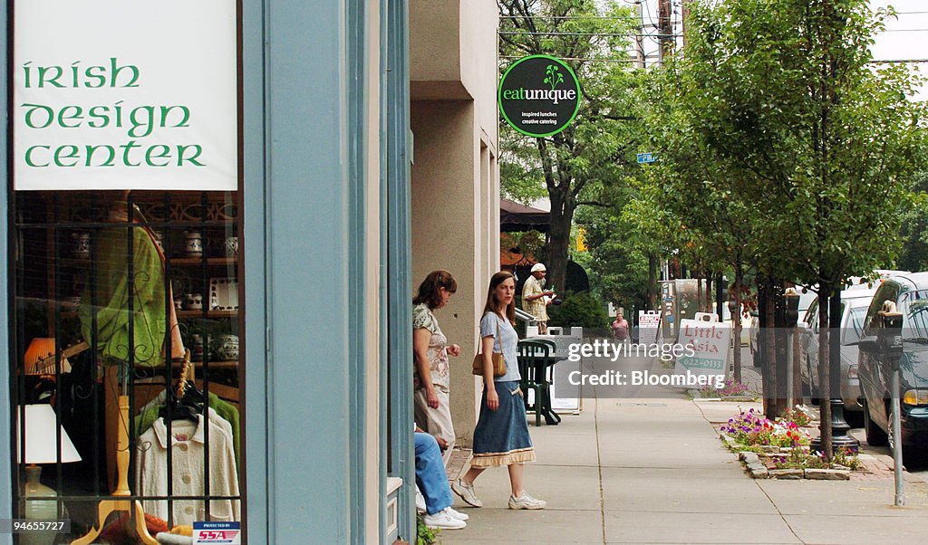 Pedestrians walk along Craig Street, nicknamed Silicon Alley