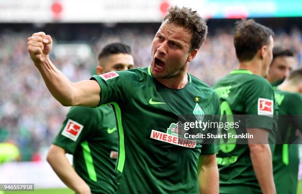 Philipp Bargfrede of Bremen celebrates the opening goal during the Bundesliga match between SV Werder Bremen and RB Leipzig at Weserstadion on April...