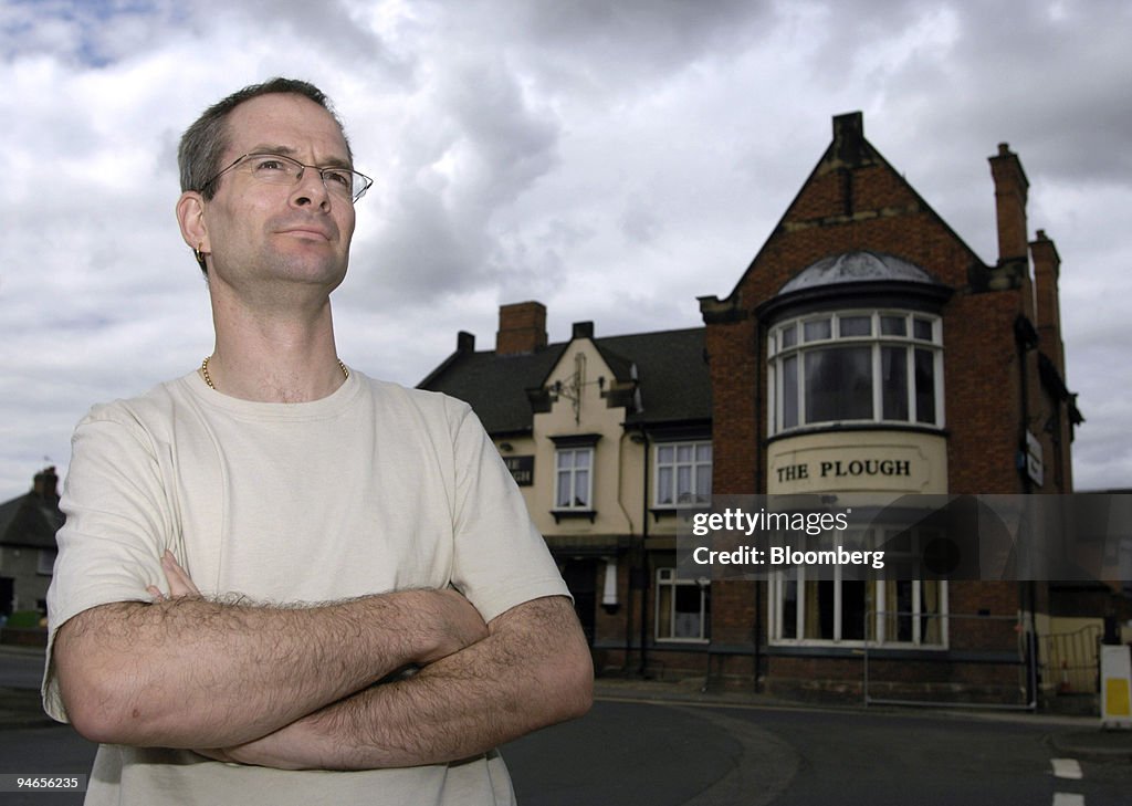 Landlord of the Plough pub, Andrew Rogerson, poses outside h