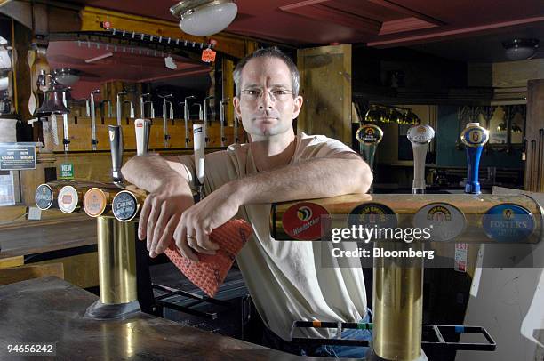 Landlord of the Plough pub, Andrew Rogerson, poses inside his damaged property in Catcliffe, Sheffield, U.K., on Tuesday, Aug. 7, 2007. Six weeks...