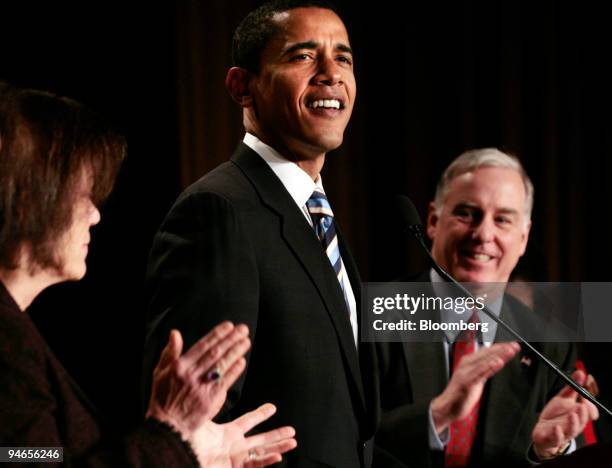 Senator, Barack Obama , speaks at the Democratic National Committee Winter Meeting as Committee Chairman, John Dean looks on in Washington, D.C.,...