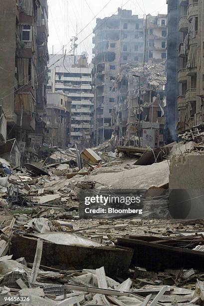 Destroyed buildings line the streets in the Hezbollah stronghold of southern Beirut, Lebanon, after Israeli air strikes on Thursday, July 20, 2006....