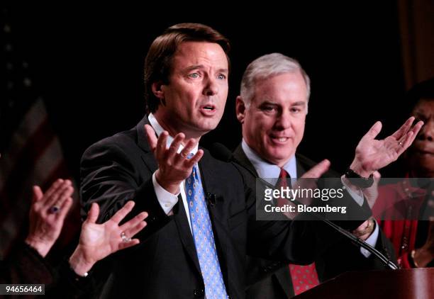 Former U.S. Senator John Edwards speaks at the Democratic National Committee Winter Meeting as Committee Chairman, John Dean looks on in Washington,...