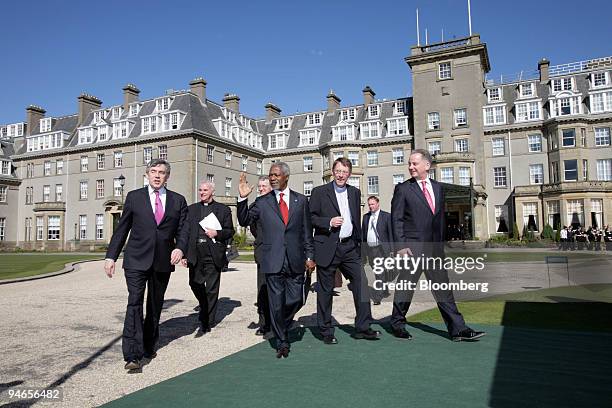 Chancellor Gordon Brown, left, Cardinal Keith O'Brien, Hilary Benn, UK Secretary of State for International Development, , Kofi Annan, former...