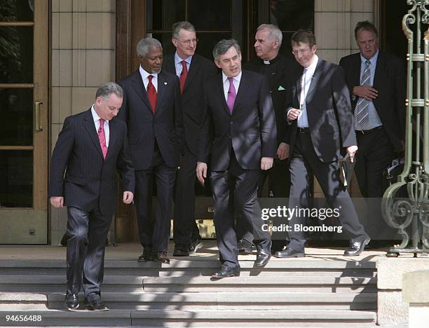 Jack McConnell, MSP and Scotland's first minister, left, Kofi Annan, former Secretary General of the United Nations, Hilary Benn, UK Secretary of...