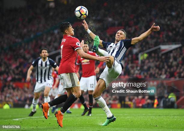 Kieran Gibbs of West Bromwich Albion and Alexis Sanchez of Manchester United in action during the Premier League match between Manchester United and...
