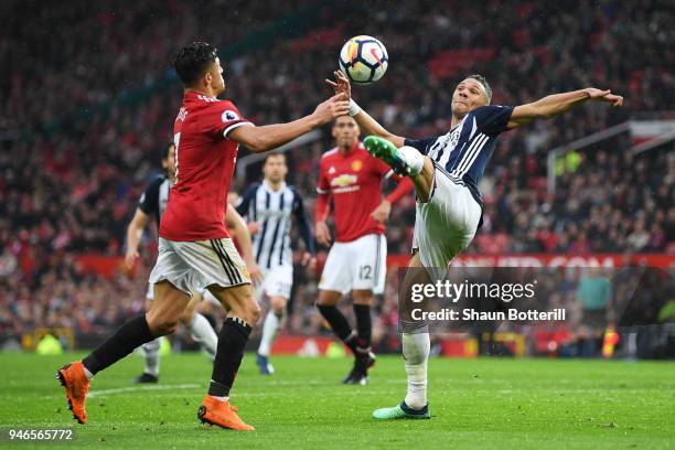 Kieran Gibbs of West Bromwich Albion and Alexis Sanchez of Manchester United in action during the Premier League match between Manchester United and...