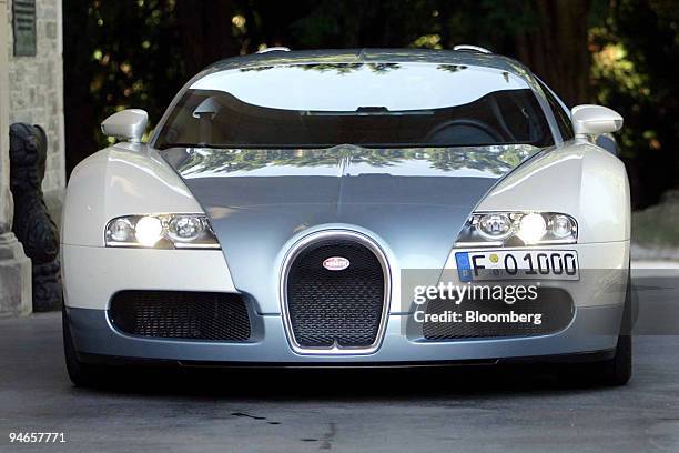 The Bugatti Veyron is seen parked outside the Schlosshotel Kronberg, in Kronberg, Germany, Wednesday, July 19, 2006. "Welcome to the 350 Club,''...