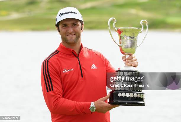 Jon Rahm of Spain celebrates with winners trophy after the final round of the Open de Espana at Centro Nacional de Golf on April 15, 2018 in Madrid,...