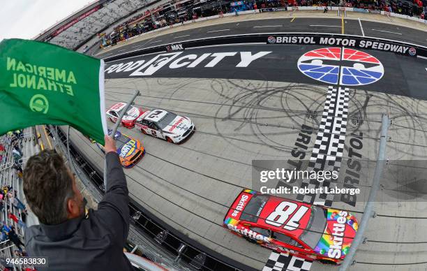 Kyle Busch, driver of the Skittles Toyota, takes the green flag to start the Monster Energy NASCAR Cup Series Food City 500 at Bristol Motor Speedway...