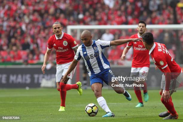 Porto's Algerian forward Yacine Brahimi vies with Benfica's Portuguese defender Andre Almeida during the Portuguese League football match SL Benfica...