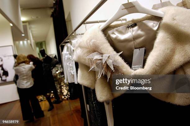 Clothing hangs on display in the Mariella Buriani shop on via Montenapoleone in Milan, Italy, on Thursday, Nov. 29, 2007. Mariella Burani Fashion...