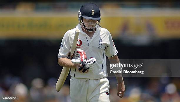 Ian Bell, batting for England, leaves the field after getting out for nought, on Day 4 of the first Ashes Test at the Gabba Cricket Ground in...