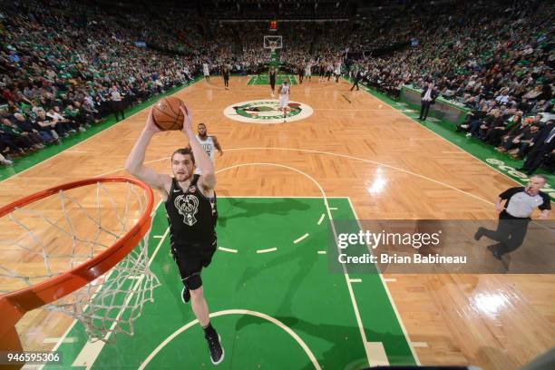 Tyler Zeller of the Milwaukee Bucks goes to the basket against the Boston Celtics in Game One of Round One during the 2018 NBA Playoffs on April 15,...