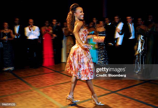 Renee Robinson, a dancer with Alvin Ailey American Dance Theater, makes her entrance for the group's opening night gala in New York, U.S., on...