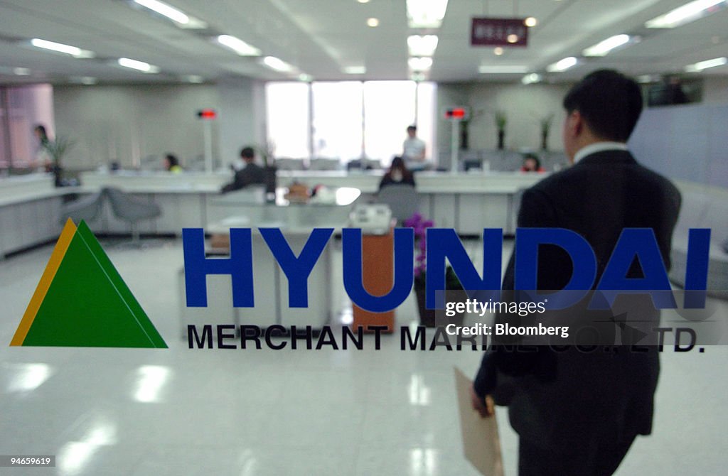 A customer walks into Hyundai Merchant Marine Co.'s offices