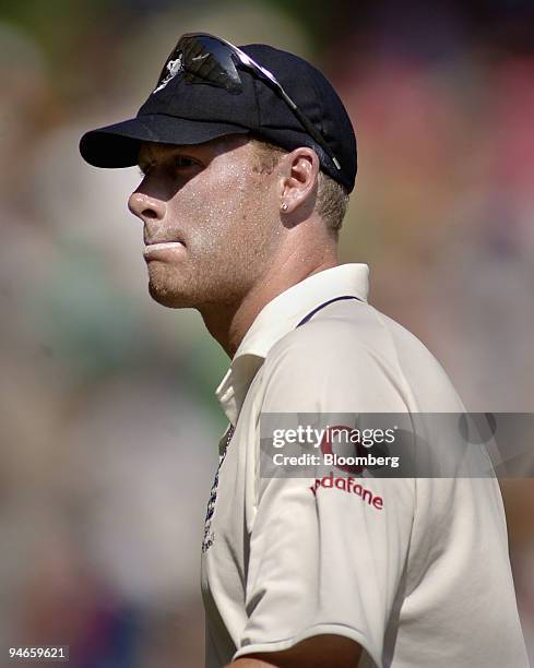 England captain Andrew Flintoff leaves the field after Australia had declared at 602-9 on day 2 of the first Ashes Test at the Gabba Cricket Ground...