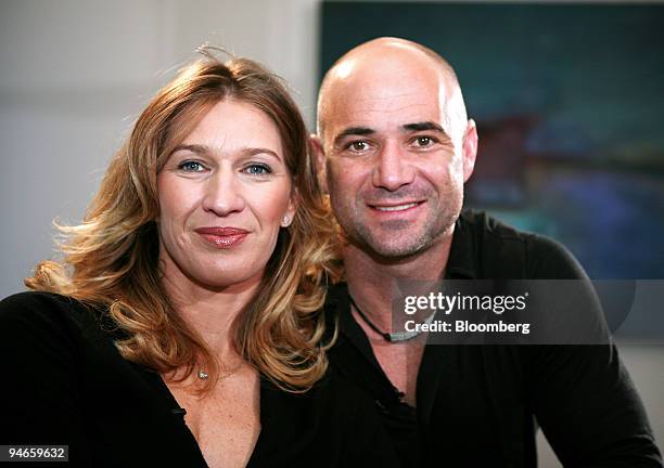 Steffi Graf, left, and Andre Agassi pose at Agassi Enterprises Inc. In Las Vegas, Nevada, Tuesday, Aug. 7, 2007. The couple, whose career tennis...