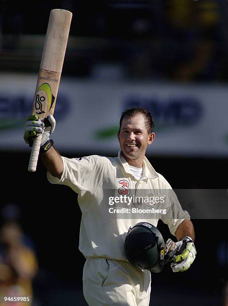 Ricky Ponting, Australia's captain, reacts after scoring a century on day 1 of the first Ashes Test at the Gabba Cricket Ground in Brisbane,...