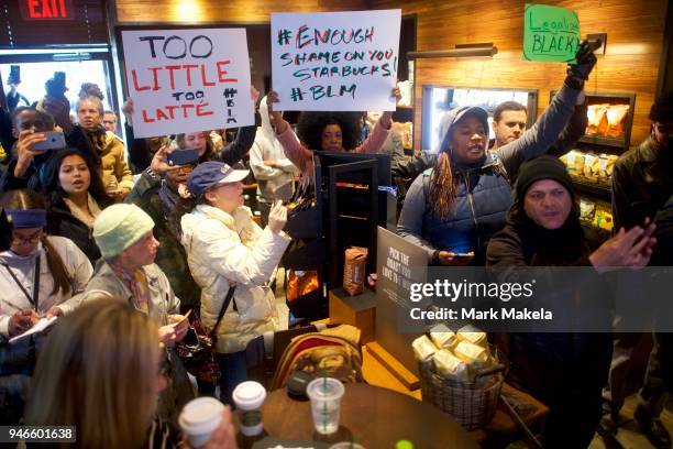 Protestor Donn T demonstrates inside a Center City Starbucks on April 15, 2018 in Philadelphia, Pennsylvania. Police arrested two black men who were...