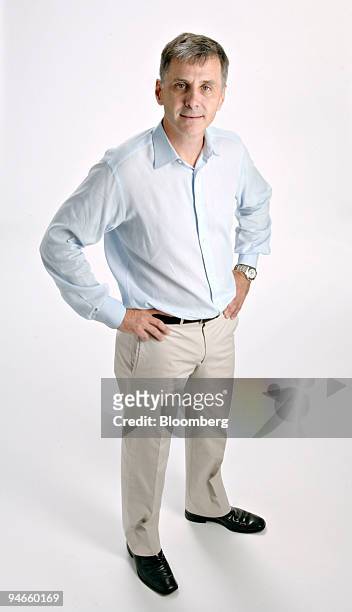 James 'Jamie' Dinan, founder and senior managing director of York Capital Management, poses in New York, Friday, July 21, 2006. The Renoir, the Monet...