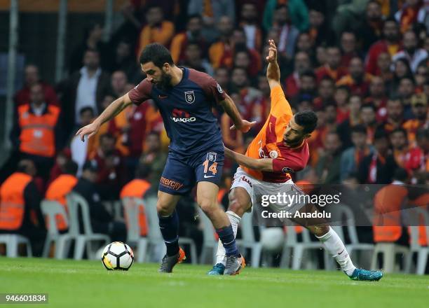 Belhanda of Galatasaray in action against Arda Turan of Medipol Basaksehir during the Turkish Super Lig soccer match between Galatasaray and Medipol...
