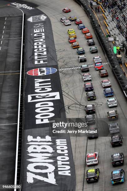 Kyle Busch, driver of the Skittles Toyota, takes the green flag to start the Monster Energy NASCAR Cup Series Food City 500 at Bristol Motor Speedway...