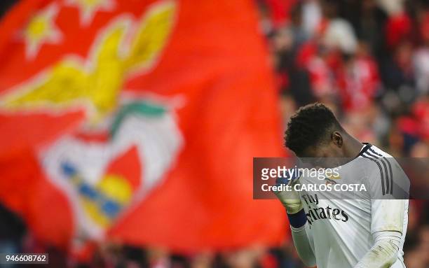 Benfica's goalkeeper Bruno Varela gestures at the end of the Portuguese league footbal match between SL Benfica and FC Porto at the Luz stadium in...