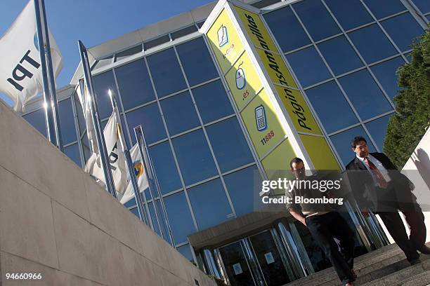 People leave the headquarters of Telefonica Publicidad e Informacion SA in Madrid, Spain, Friday, April 28, 2006. Yell Group Plc, a publisher of...