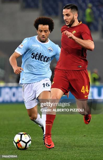 Roma's defender from Greece Kostas Manolas vies with Lazio's midfielder from Brazil Felipe Anderson during the Italian Serie A football match between...