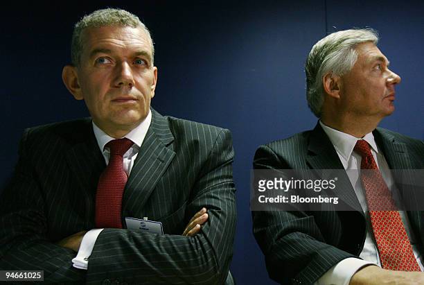 Christian Streiff, chief executive officer of Airbus SAS, left, and John Leahy, executive vice president and chief commercial officer, listen during...