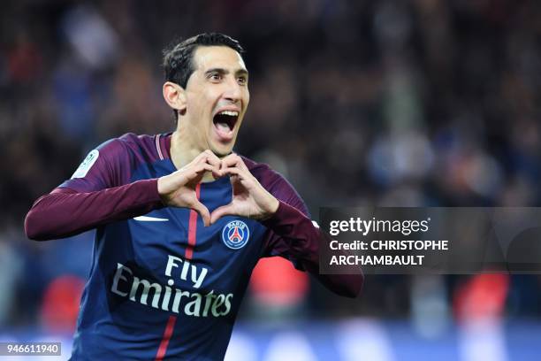 Paris Saint-Germain's Argentinian forward Angel Di Maria celebrates after scoring a goal during the French L1 football match between Paris...